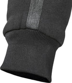 Närbild på benslutet av GMS Kevlar Mc-Mjukisbyxor Jogger Cruz Svart med ribbad mudd och reflexband för synlighet.