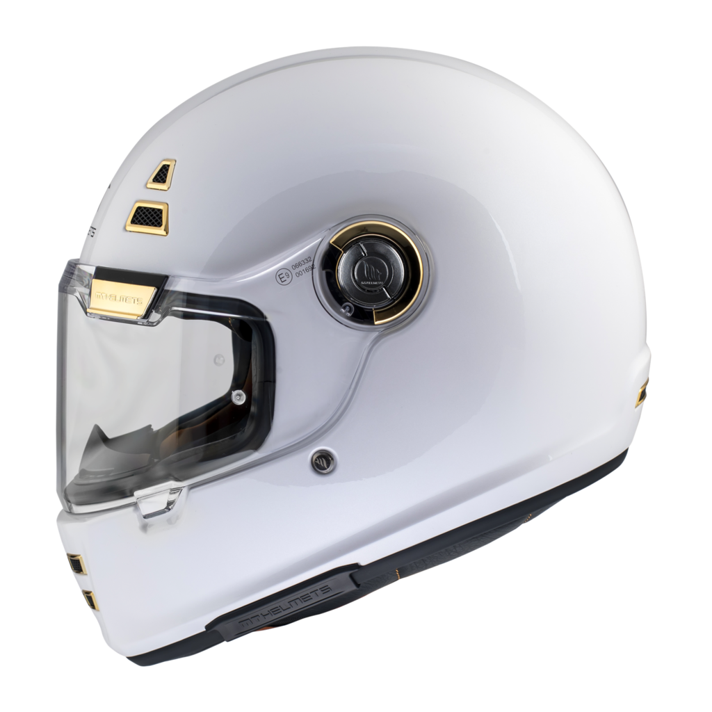 MT Helmets Integral Mc-Hjälm Jarama A0 Pearl White med vit finish och gulddetaljer, visir och ventilationsöppningar. Perfekt för stadskörning och säkerhet.