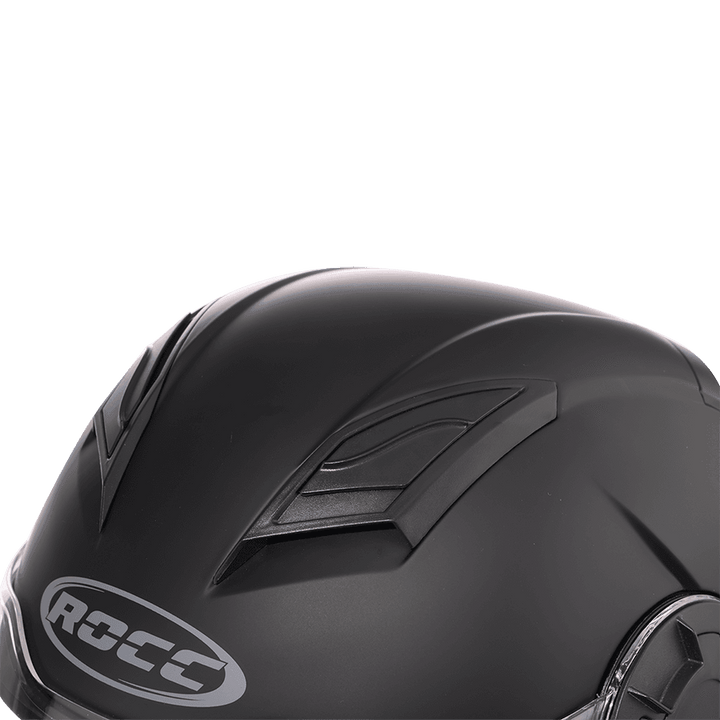 Detaljbild av Rocc Jet MC-Hjälm 285 Svart med aerodynamisk design och integrerade ventilationsöppningar.
